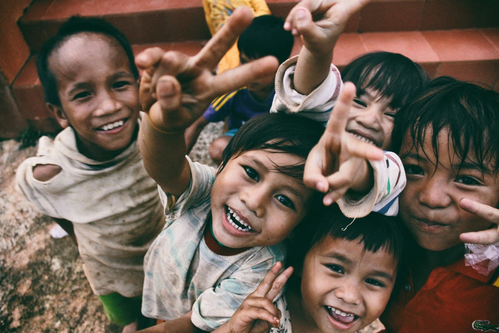 Children at a community gathering, representative stock photography