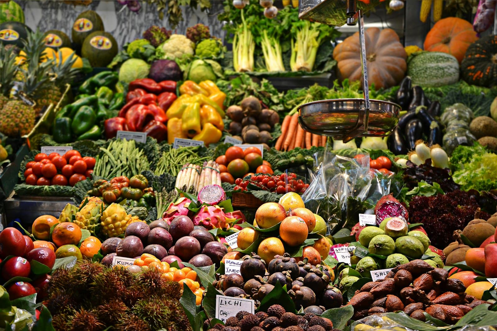 Livelihood: Colourful market stall of fresh produce grown and sold through small enterprise